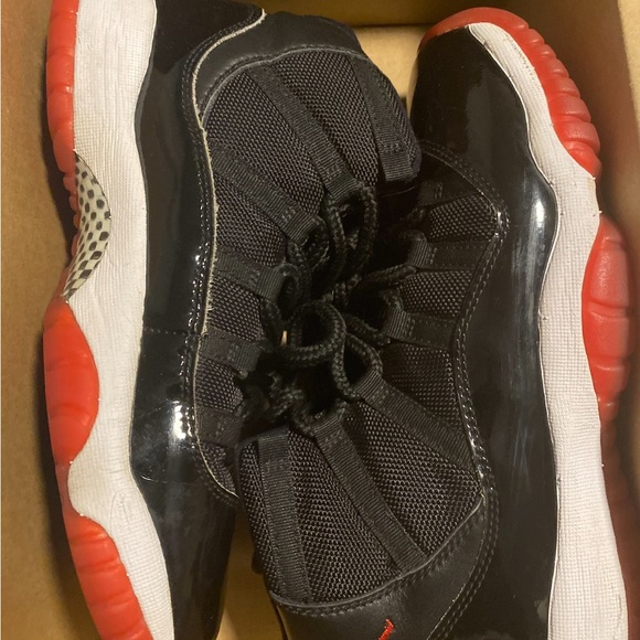 Jordan Other - Air Jordan 11 Retro Black and Red Sneakers